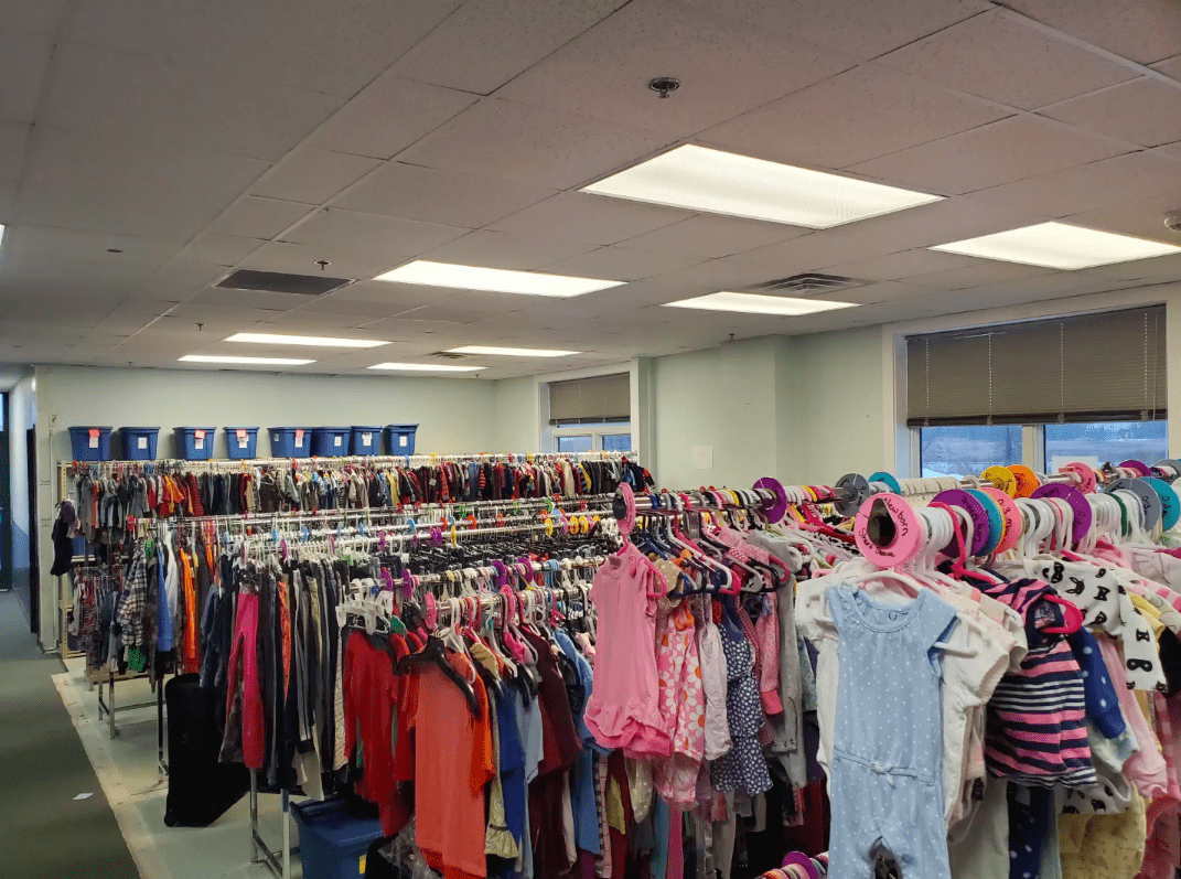 Clothing racks inside the Wisconsin Foster Closet.